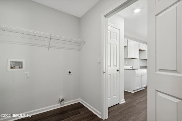 laundry room featuring hookup for a washing machine, dark wood-type flooring, and hookup for an electric dryer