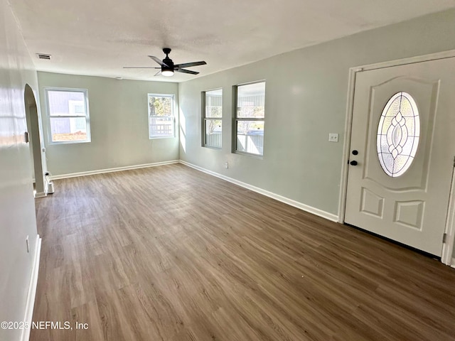 entryway with wood-type flooring and ceiling fan