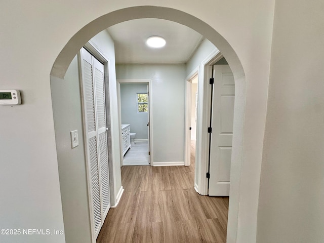 hallway featuring light hardwood / wood-style flooring