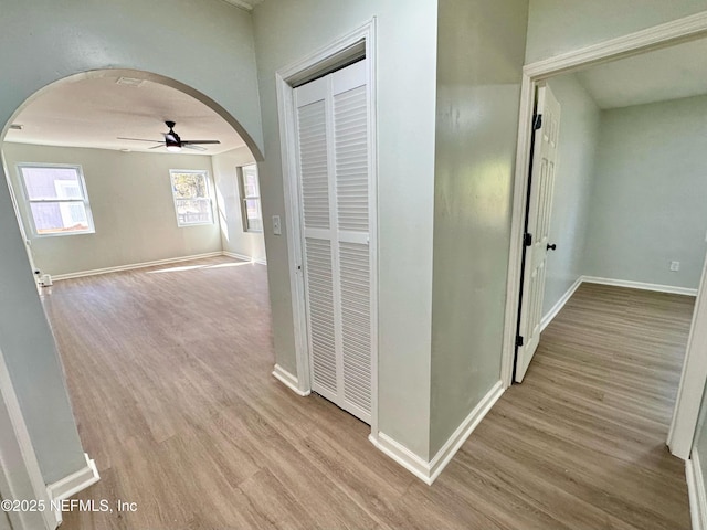 hallway with light wood-type flooring