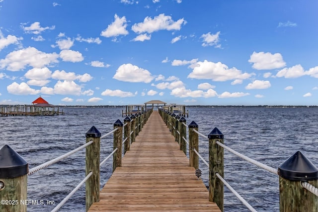 view of dock with a water view