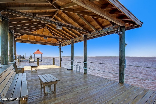 dock area featuring a gazebo and a water view