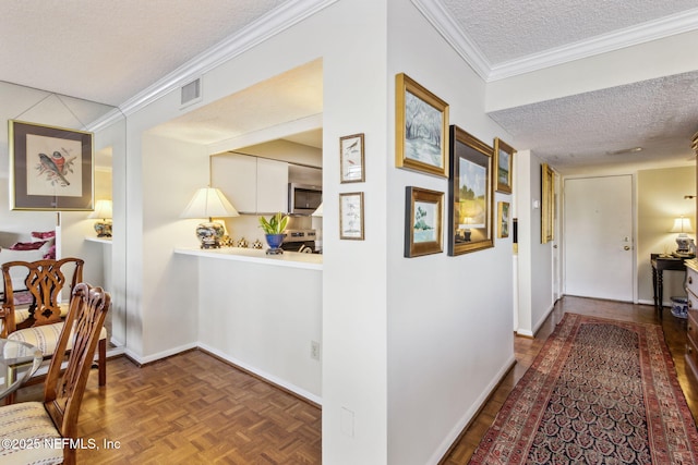 hallway featuring crown molding, a textured ceiling, and dark parquet floors