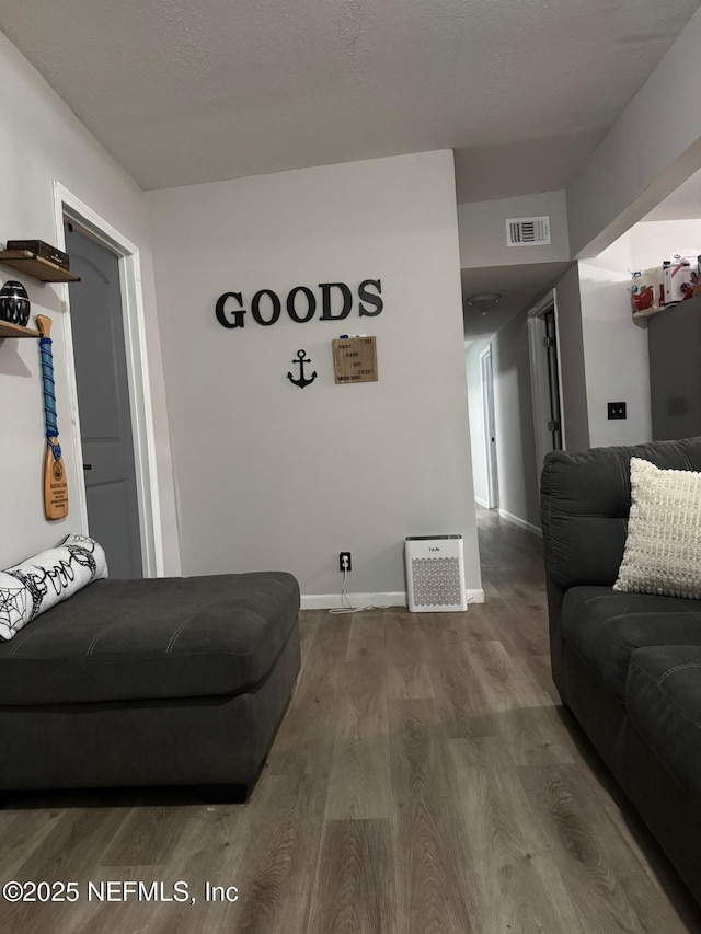 living room with hardwood / wood-style floors