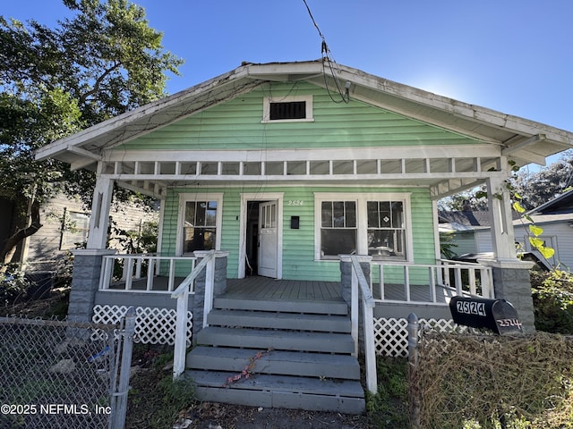 bungalow-style home with a porch