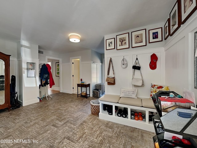 mudroom featuring parquet floors