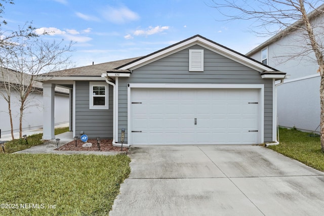 ranch-style house with a garage and a front yard