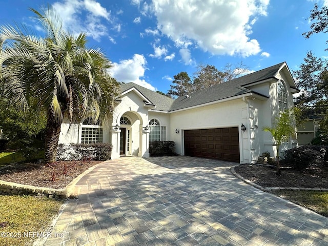 view of front of home featuring a garage