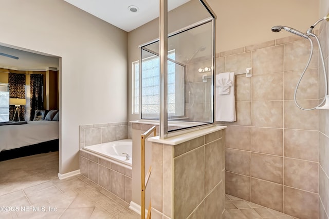 ensuite bathroom with tile patterned floors, tiled shower, a garden tub, and ensuite bathroom