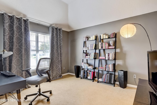 carpeted office with baseboards