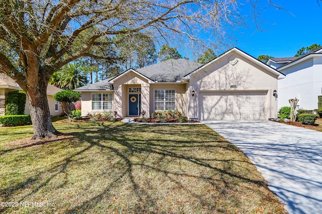 ranch-style home featuring a front lawn, concrete driveway, roof with shingles, stucco siding, and an attached garage