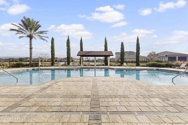 view of pool with a gazebo and a patio area