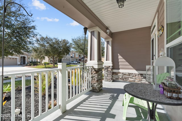 balcony featuring covered porch