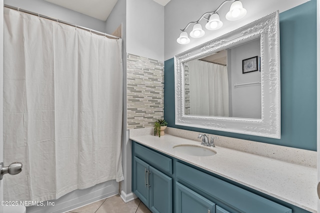 bathroom with tile patterned floors, vanity, and shower / bath combo