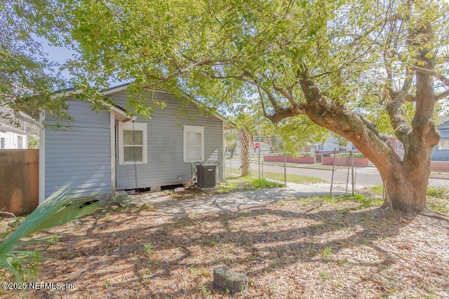 view of yard featuring central AC unit