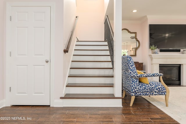 staircase with ornamental molding