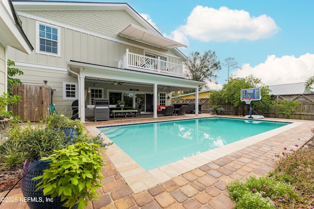 view of pool featuring a patio