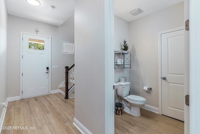 foyer with light hardwood / wood-style flooring