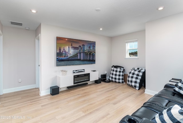 living room featuring light wood-type flooring