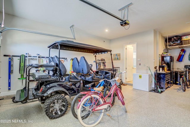 garage featuring a garage door opener