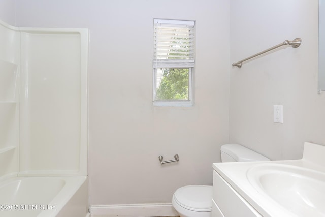 full bathroom featuring shower / tub combination, vanity, and toilet