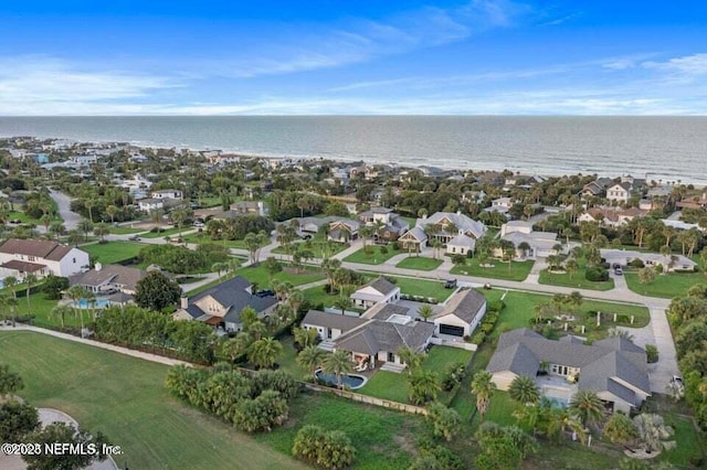 aerial view with a residential view and a water view