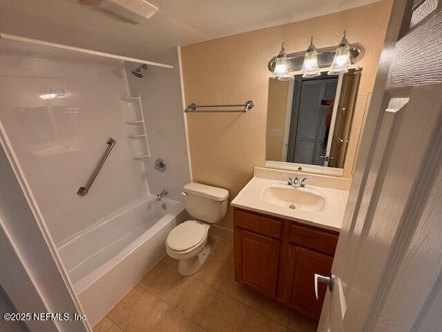 full bathroom featuring tile patterned flooring, toilet, vanity, and shower / bathing tub combination