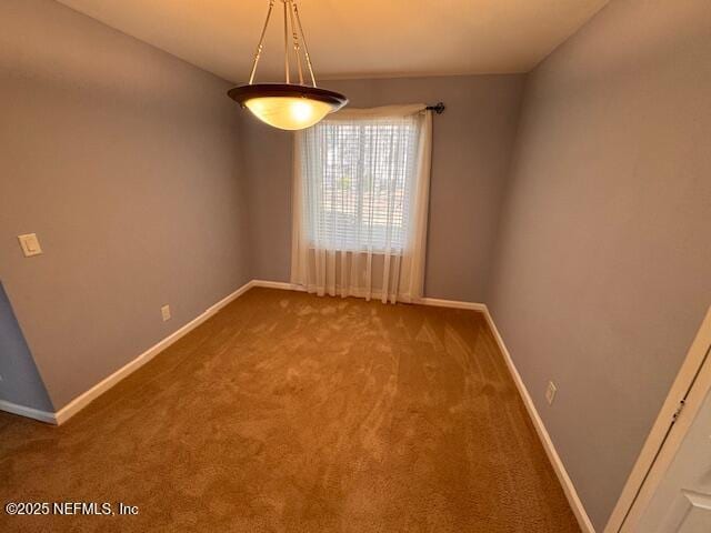 view of carpeted spare room