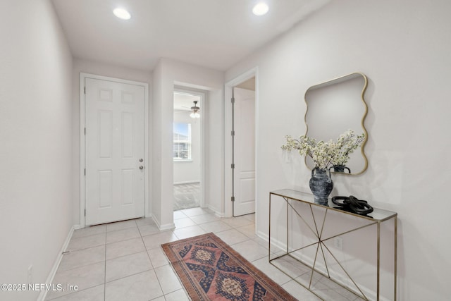 foyer entrance featuring light tile patterned flooring