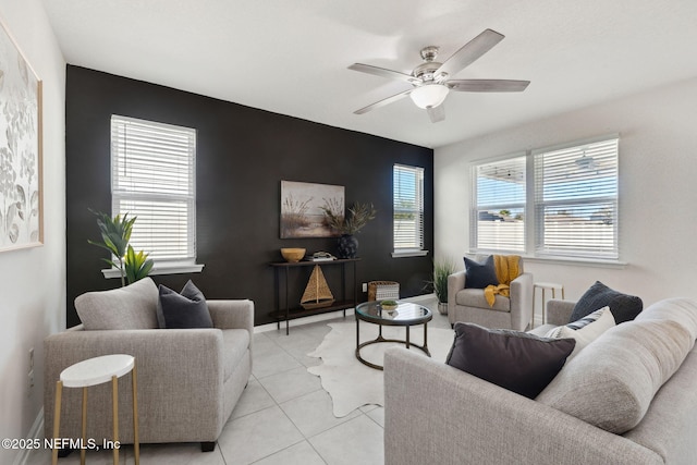 tiled living room with ceiling fan