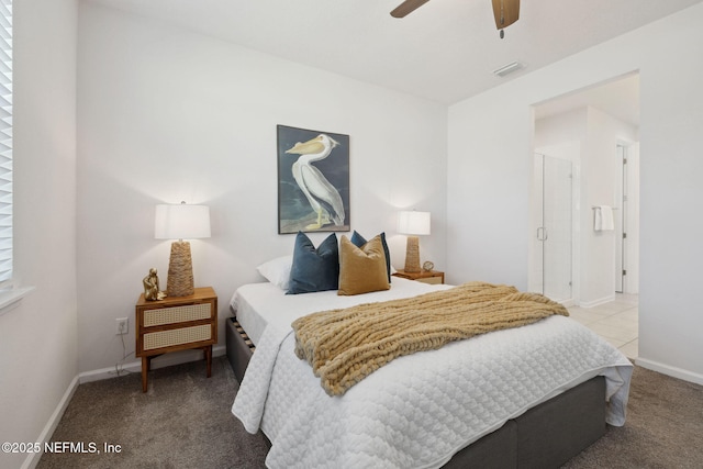 bedroom featuring light carpet and ceiling fan