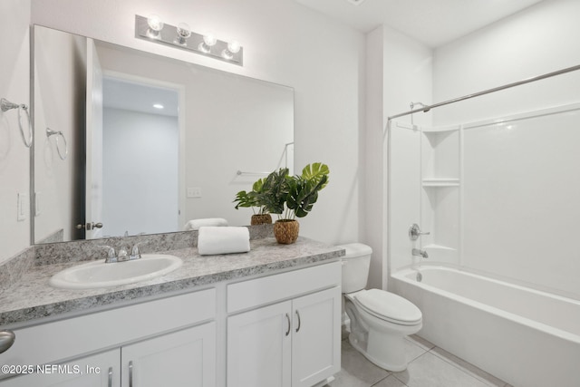 full bathroom featuring tile patterned floors, vanity, toilet, and  shower combination