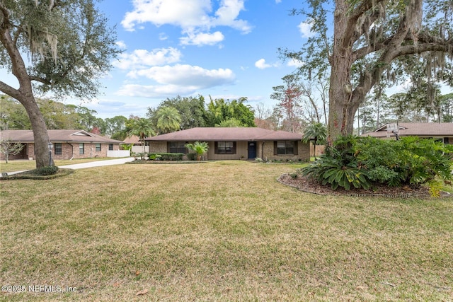 ranch-style house with a front yard