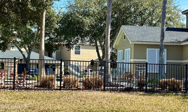 exterior space featuring a lawn