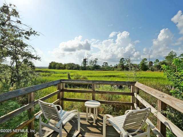 balcony featuring a rural view