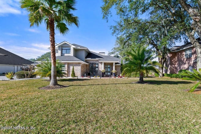 view of front facade featuring a front yard