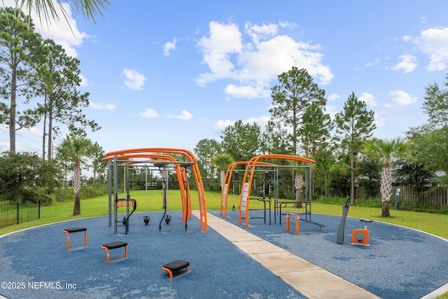 view of jungle gym with a lawn