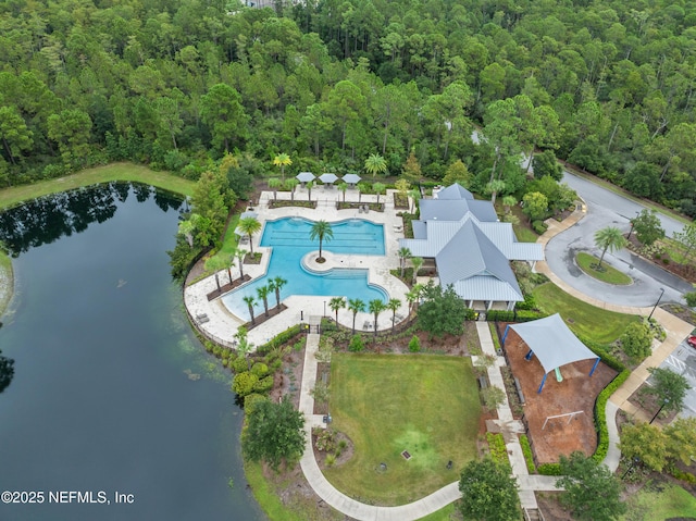 birds eye view of property with a water view