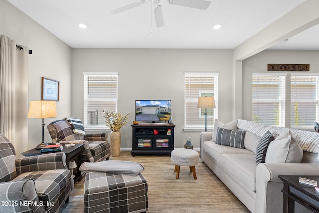 living room with ceiling fan