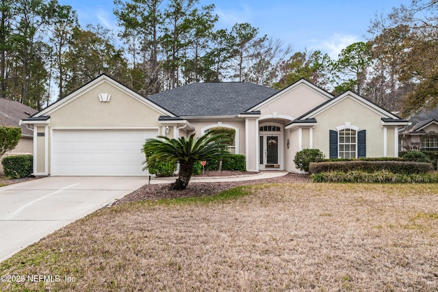 single story home featuring a garage