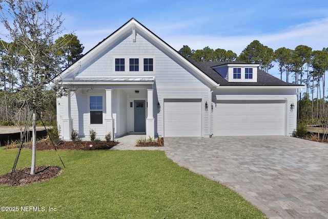 view of front of home with a front lawn