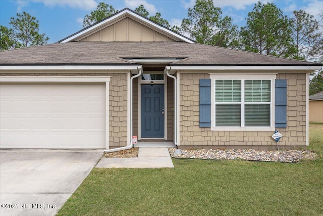 ranch-style house featuring a garage and a front yard