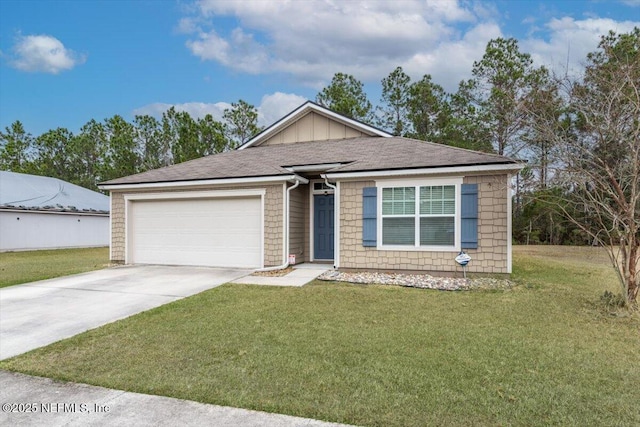 view of front of house with a garage and a front yard