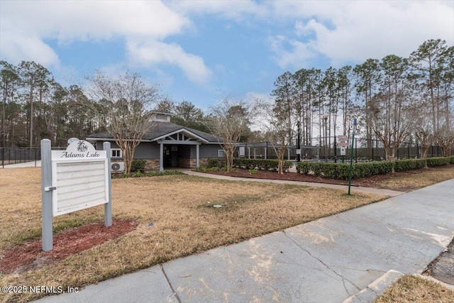 view of community featuring a lawn