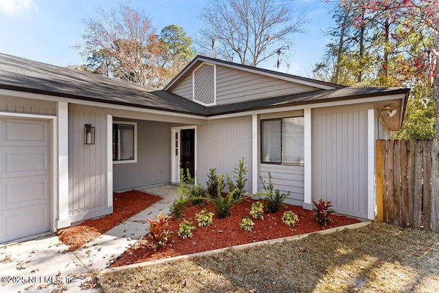 single story home featuring a garage