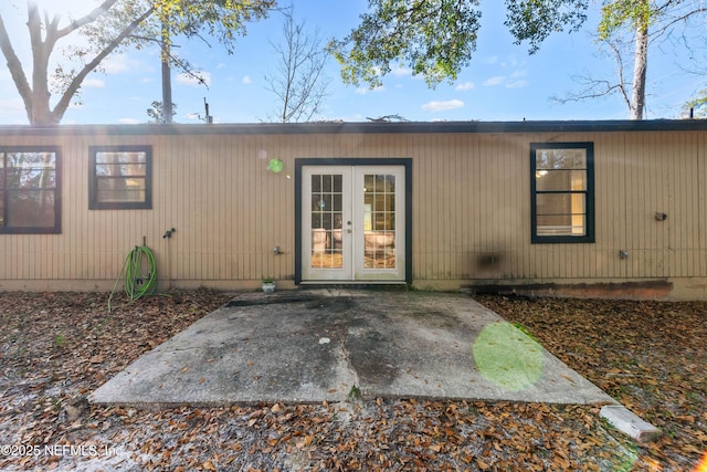 doorway to property featuring a patio and french doors