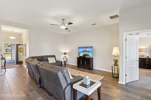 living room with ceiling fan