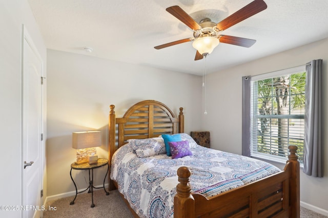 bedroom with light carpet and ceiling fan