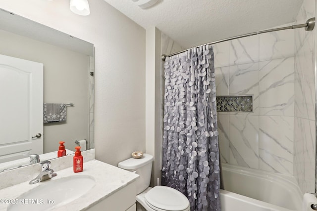 full bathroom featuring shower / tub combo, vanity, toilet, and a textured ceiling