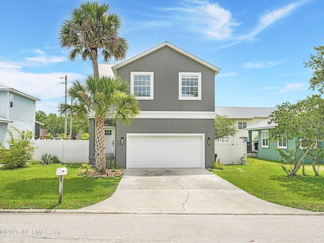 view of front of property featuring a garage and a front yard